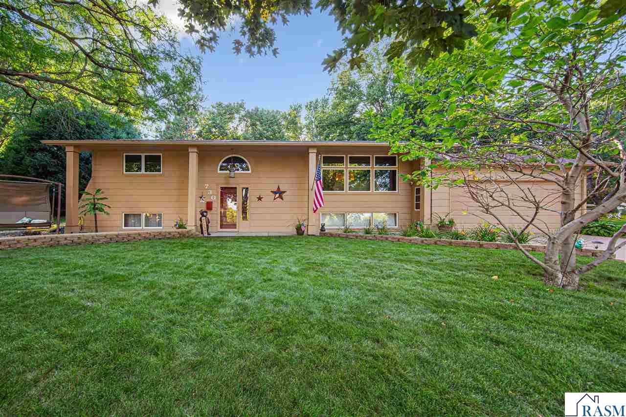 Welcome home to this beautifully updated 4-bedroom, 2-bath split foyer with a 2-stall garage in St. Peter! The exterior shines with fresh paint (2025), a brand-new roof (2024), and attractive landscaping. Inside, enjoy two spacious living rooms—one on the upper level and another in the lower level—plus all new carpet, fresh paint, remodeled bathrooms, and an updated kitchen with newer appliances. The upper-level bath features a clever Jack-and-Jill design with a shared shower room separating two half baths—one connected to the primary suite and the other serving the rest of the home. Step outside to a fenced backyard with a deck, concrete slab patio, and plenty of space to relax or entertain. With thoughtful updates throughout this move-in ready home is a must-see!