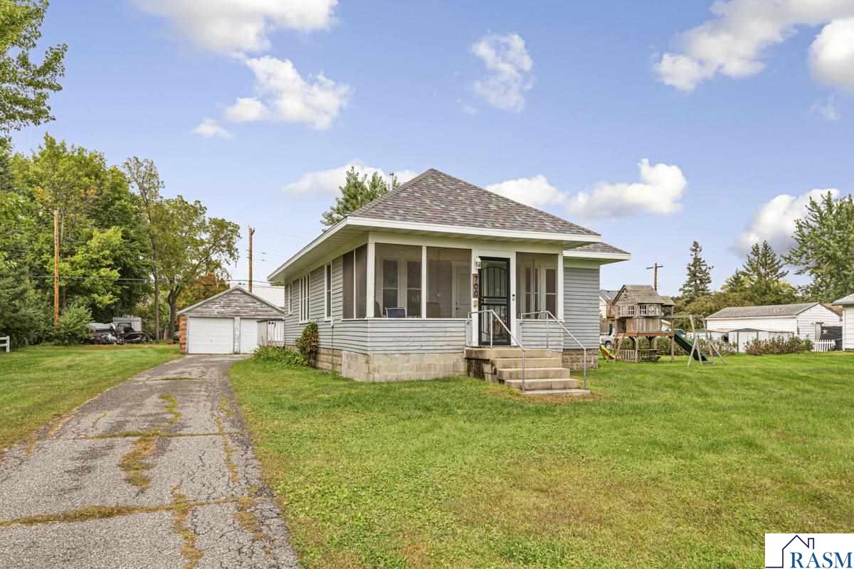 Welcome to 700 Washington Street in Cleveland! This 2-bedroom, 1-bath home sits on a generous 0.43-acre lot and offers great potential. Enjoy the screened-in front porch, a back deck perfect for relaxing, and a cozy living room with space for a dining area. Recent updates include newer windows and carpet in the living room. The basement provides plenty of storage. Great opportunity to make it your own.