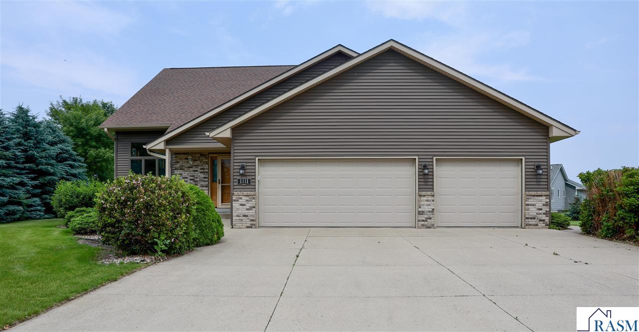 Spacious, stylish, and steps from Lake Crystal! Located in the Crystal Creek Subdivision, this 4-bed, 3-bath home features vaulted ceilings, a formal living room, eat-in kitchen, lofted flex space, and a private primary suite with en suite bath. Finished basement, 3-stall garage with workshop extension, and maintenance-free deck add to the appeal. Bonus: Seller is offering a $7,000 flooring credit with an acceptable offer.