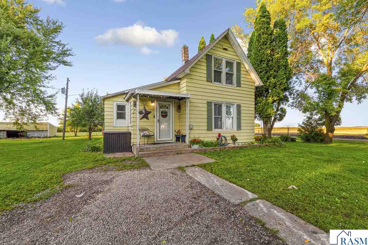 Welcome to this 2-bedroom, 1-bathroom farmhouse offering the perfect blend of modern updates and country charm. The home features durable metal siding, a brand-new roof (2024), and a remodeled kitchen (2023). Enjoy the comfort of central air and forced-air heat year-round. Set on 5 acres, the property includes an impressive collection of outbuildings ready for a variety of uses. Highlights include a 60x40 machine shed, detached garage, 12x16 granary, 8x10 pump house, three 27x17 hog houses, and a 48x40 barn. Whether you’re looking for hobby farming, storage, or workshop space, this property has it all. A rare opportunity to enjoy country living with the convenience of modern updates.