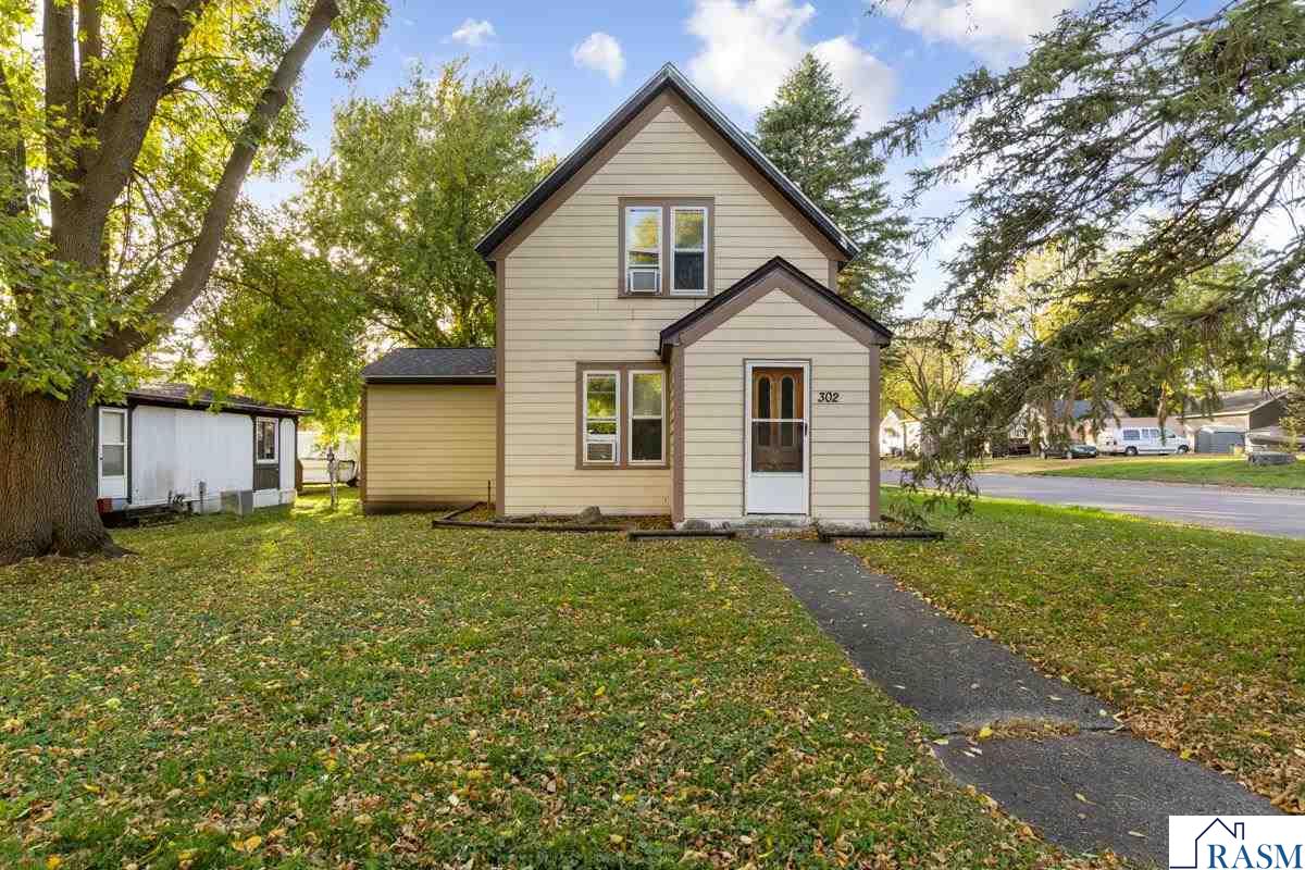 Welcome to this cozy 1 1/2 story home. This 3 bedroom, 2 bath home has charm and warmth. The deck welcomes you into the kitchen. Main floor laundry with newer washer and dryer in 2024. Main level primary bedroom, living room and informal dining room. Upstairs you will find two more bedrooms and a full bathroom. New furnace and roof on both the house and the garage in 2025.