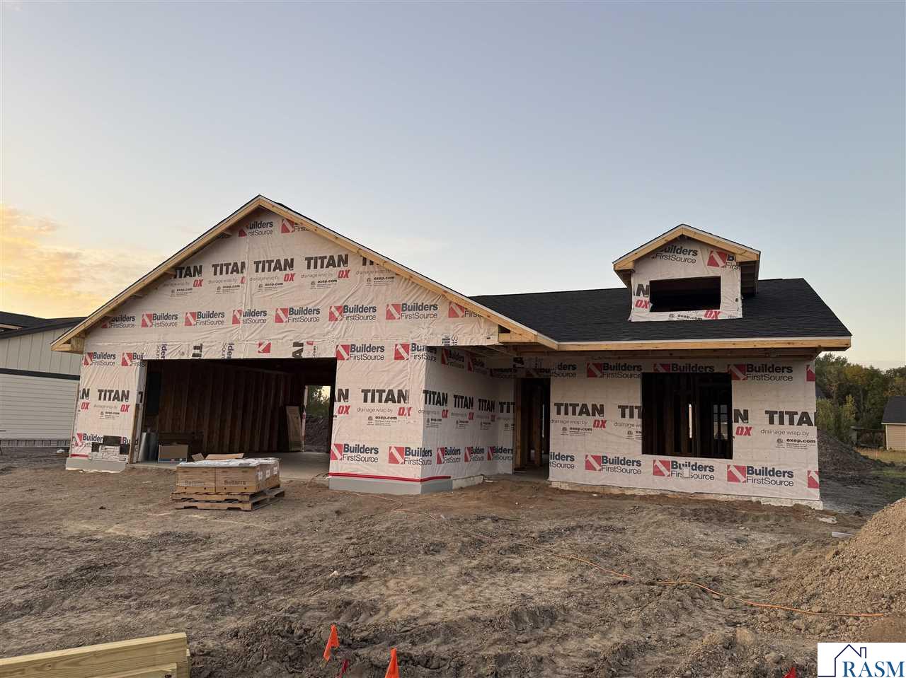 New Construction - 2 bedrooms, 2 bathrooms, oversized 2-stall garage.  Step into modern comfort with this stunning new construction patio home featuring an open-concept layout designed for both relaxation and entertaining. The heart of the home is the spacious living area, complete with a cozy gas fireplace and seamless flow into the kitchen and dining spaces. The kitchen boasts granite countertops and backslpash, stainless steel appliances, and upgraded finishes throughout, making it as beautiful as it is functional. The primary suite is a true retreat, featuring a private ensuite bathroom with ceramic tile, a walk-in shower, and a generous walk-in closet. The second bedroom and full bath provide comfort and convenience for guests or flexible living space. Enjoy the outdoors on the 12x14 patio, ideal for morning coffee or evening gatherings. Additional highlights include: dual service on-demand water heater with in-floor heat throughout, and a 20x24 pull-up attic space offering exceptional storage. This home delivers low-maintenance living with all the upgrades you’ve been looking for—don’t miss the opportunity to make it your own!