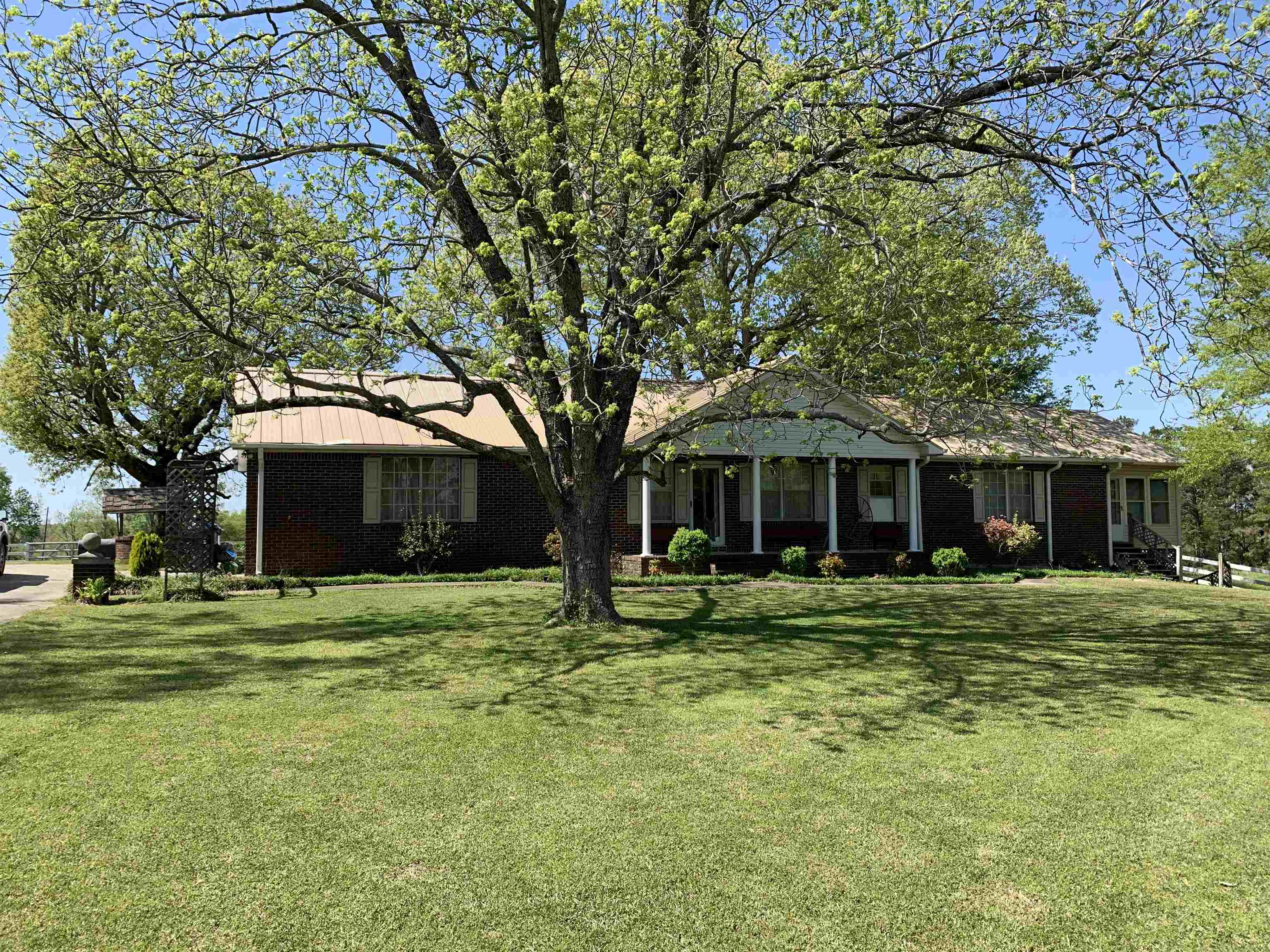 Charming farmhouse with income already in place.  This property has 2 houses & 40 acres on a county road dead end. The 40 acres has approximately 70% pasture and 30% mature hardwoods.  This is a must see.