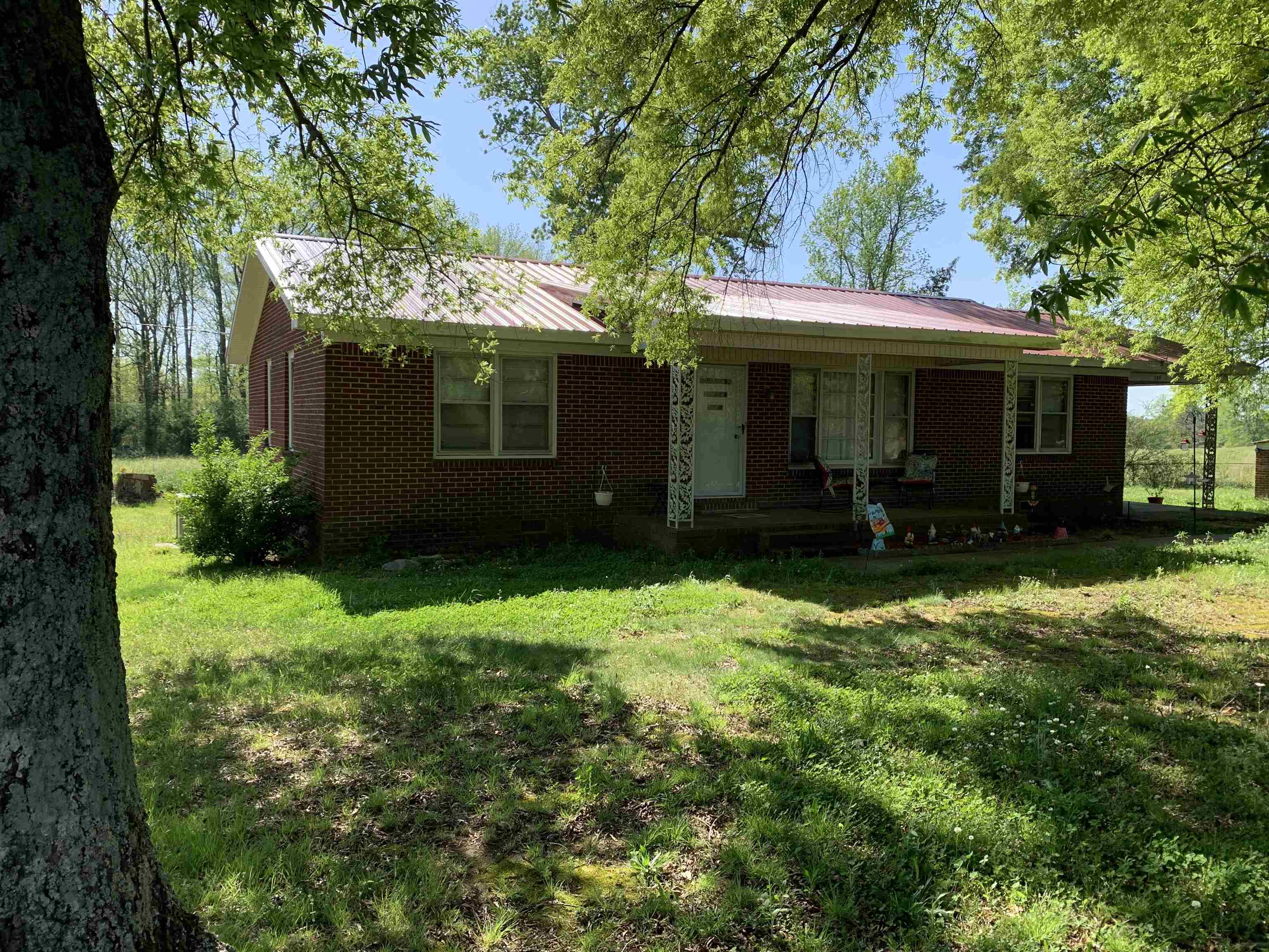 Charming brick home in the country side of Phil Campbell.  This little home is gorgeous and needs absolutely nothing.  Kept clean and really well taken care of.  Just the perfect place to settle down.