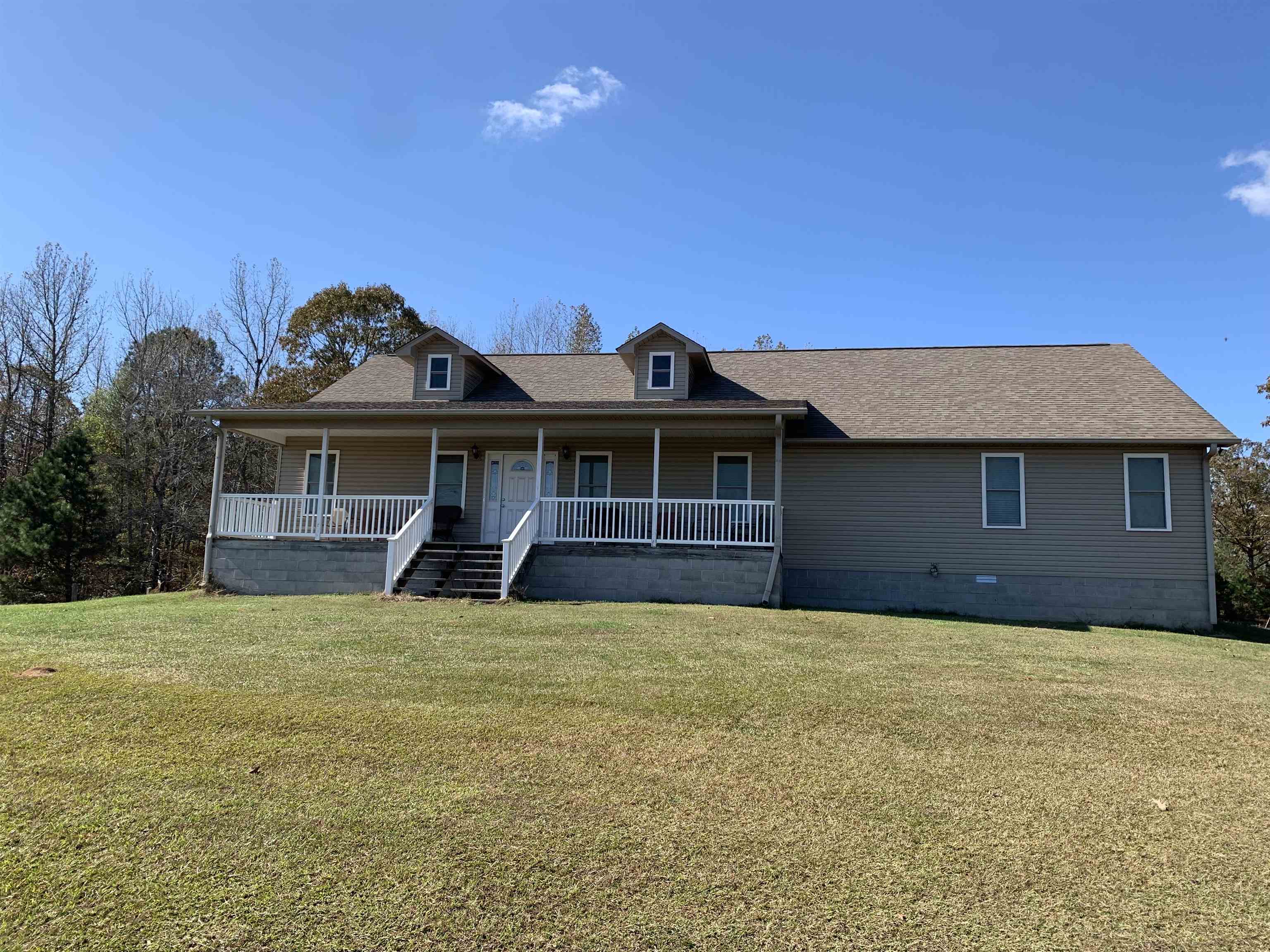 Absolutely amazing farm house on it's own slice of paradise.  This home is simple but solid.  Amy farmer or outdoor enthusiast would live to have this place.  45 +/- acres, 23 on sq. ft. home, and big barn to keep all equiptment.  Don't miss out, this one is for you!