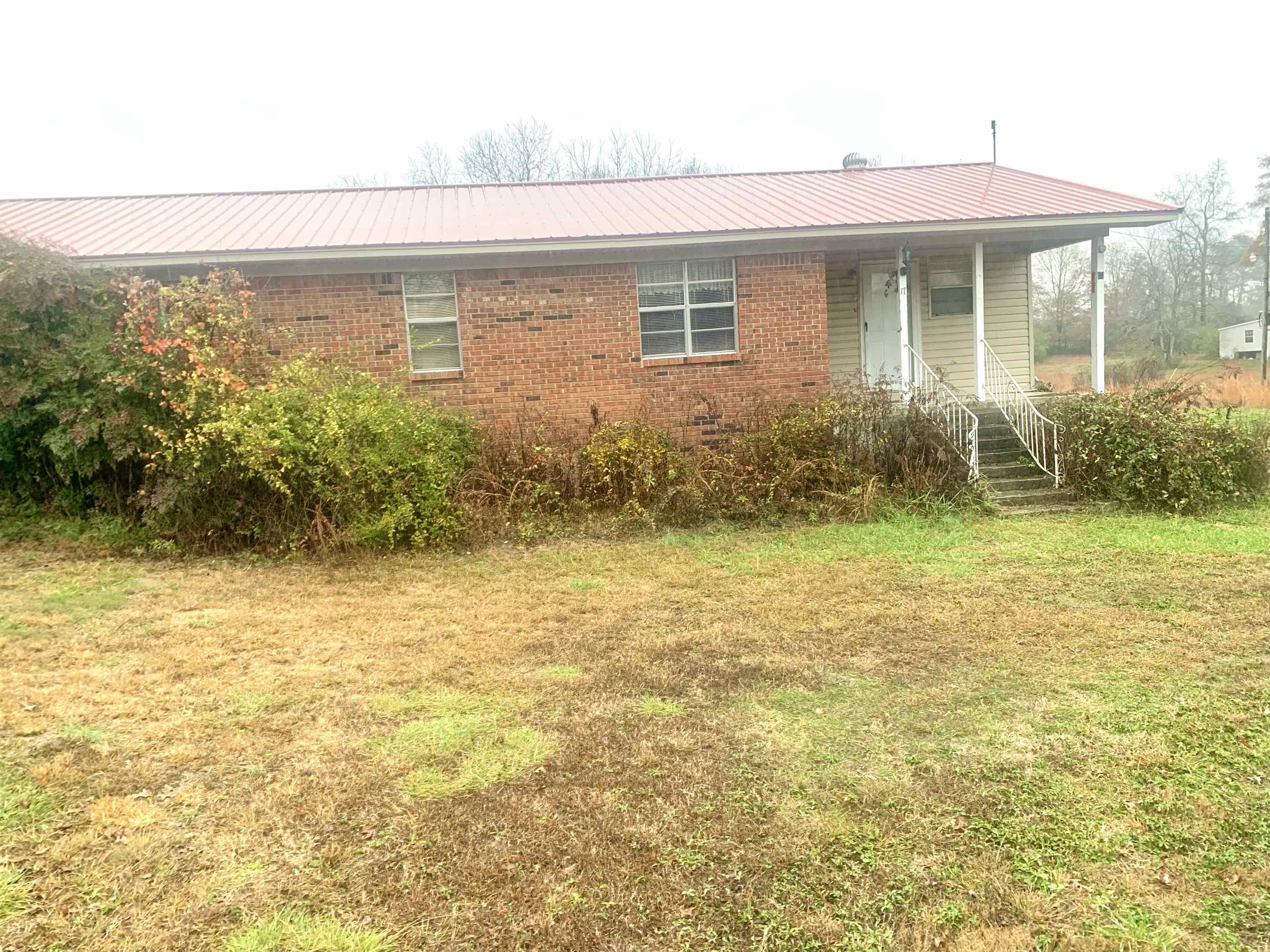 Take a look at this 3 bedroom 2 bath brick rancher sitting on 4.27 +/- acres in rural Phil Campbell.  Many possibilities for this home sold as is! There is a mobile home on the property that will convey at no value.  Call to schedule your showing.