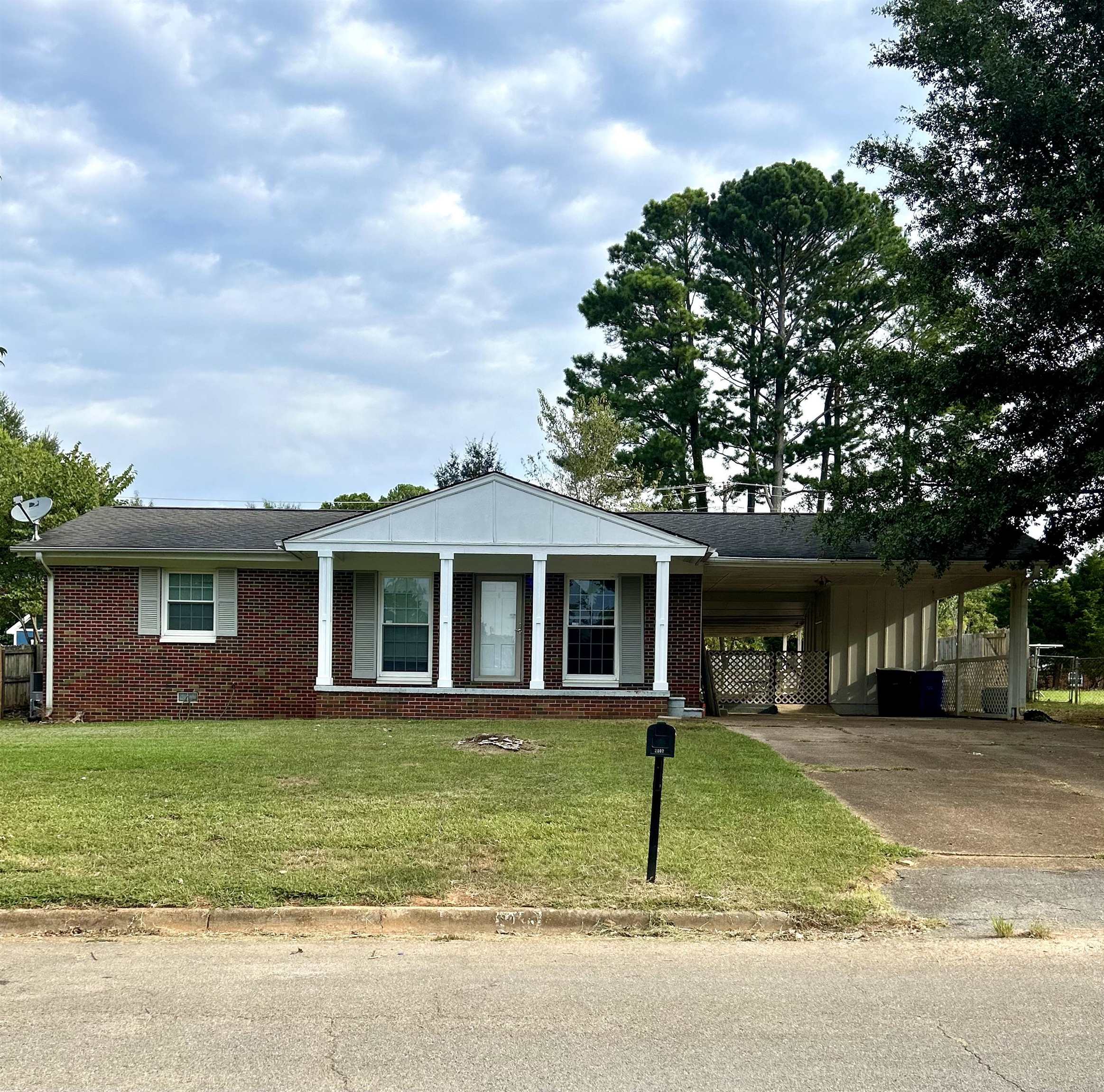 Located within minutes of the mall, downtown and UNA this 3 bedroom, 2 bath ranch is perfect for first time homwowners.  Enjoy the large, covered patio located off the 2-car carport.  The fenced backyard is perfect for children or pets to play.  Call to schedule your private showing today!  Sold as is.
