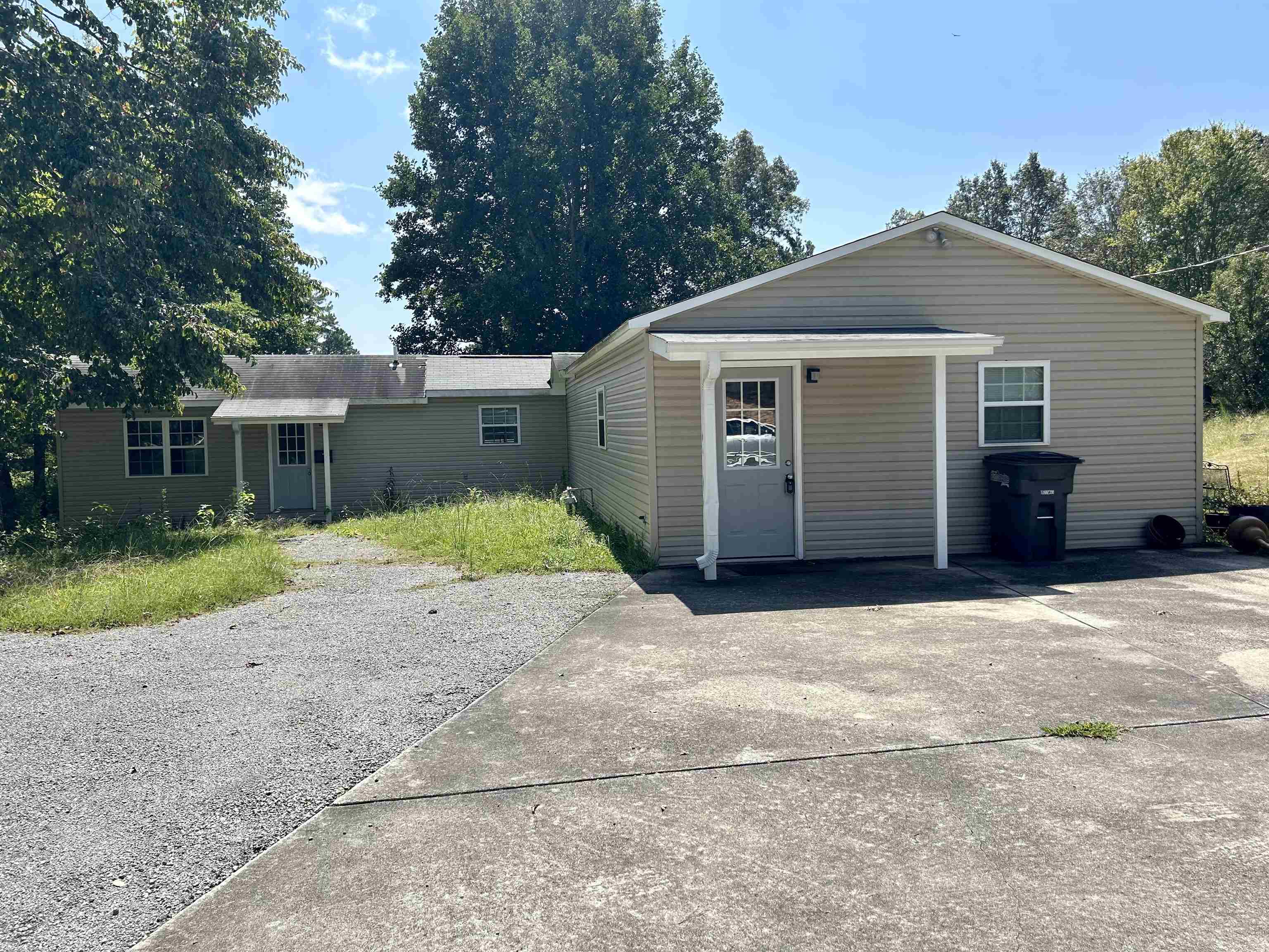 If you are looking for a home two blocks from Russellville City Schools or a local office, this is it! Seller used the home as an office.  Features two half baths with a perfect closet area to add a shower/bath and laundry.  Seller put up walls to create four offices that can become three bedrooms including a good size primary bedroom.  There is a large living and dining area.  Call to schedule your private showing and discover the possibiliies.  House sold as is!