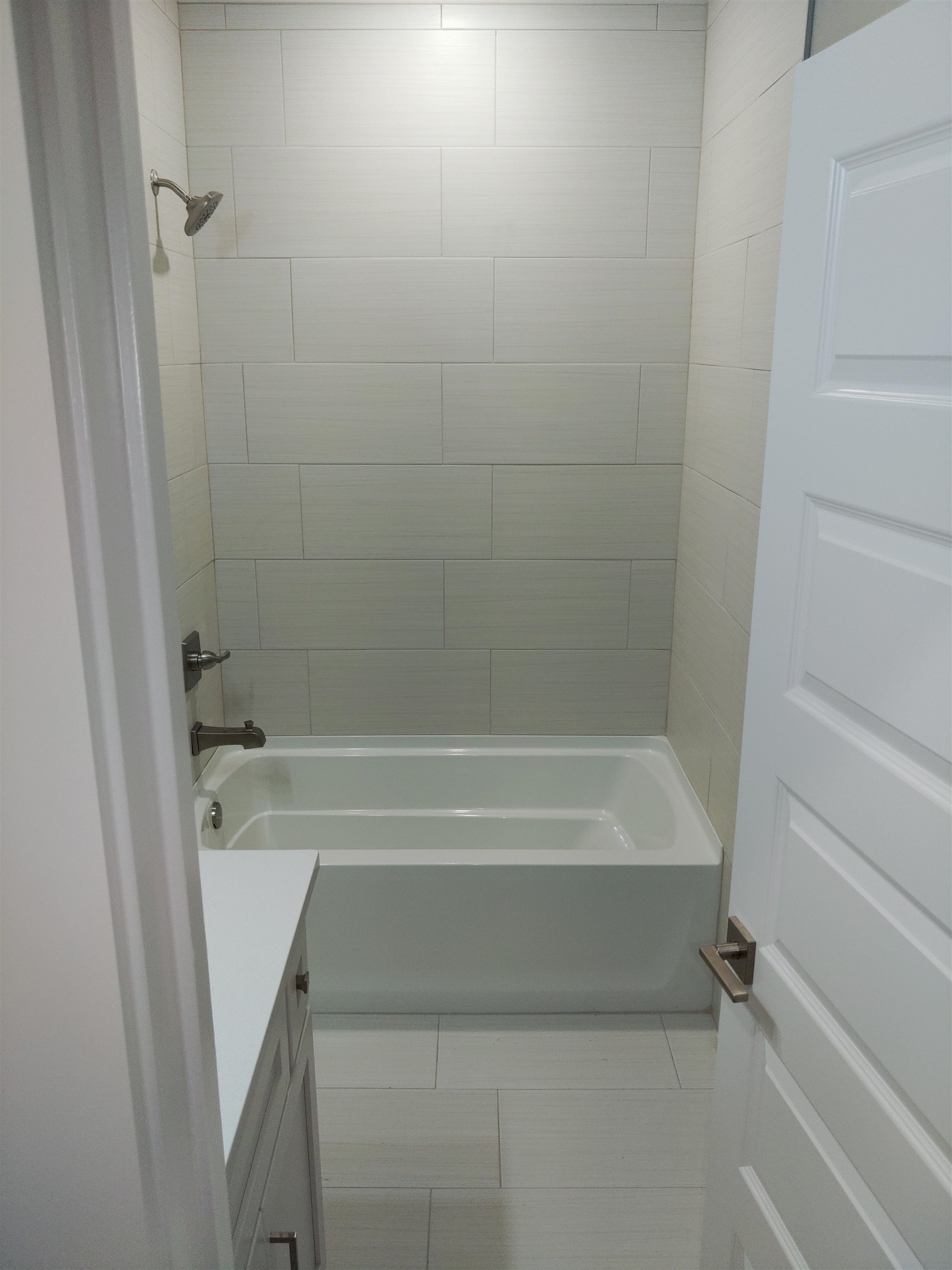 Full bath located between Bedrooms 2 and 3