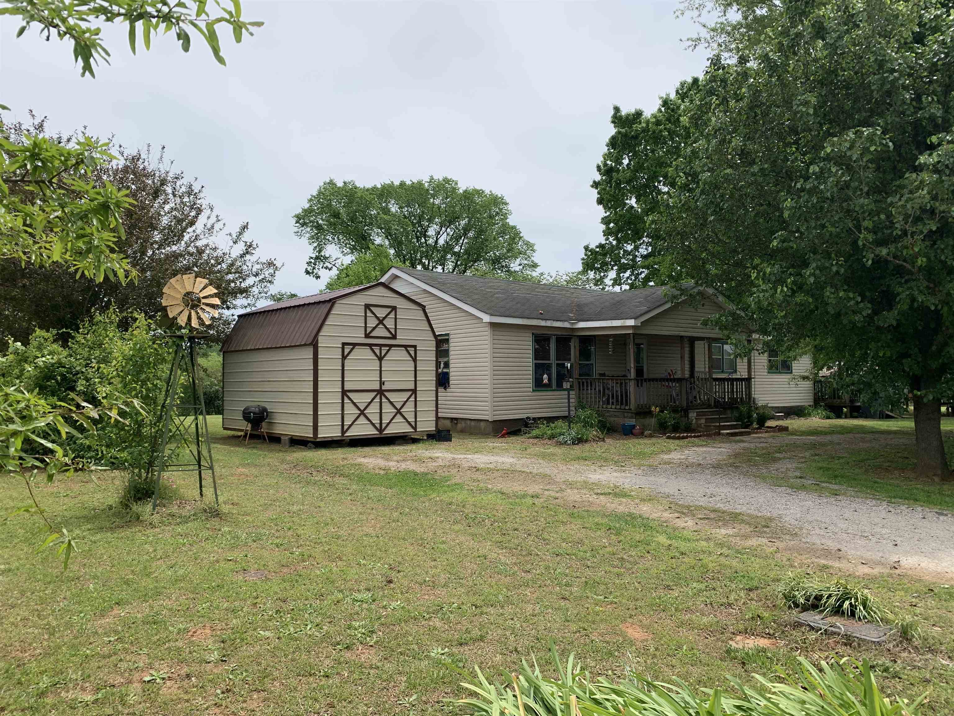 Quite little home just outside of the Russellville City limits.  This home has 2 acres of yard with big shade trees.  Perfect setting to enjoy family time.  The house boasts 4 beds and lots of space.  This area is highly sought after.  Don't miss out.  All offers must be submitted by May 3rd at 10PM.  Buyer to verify all info in listing is correct.