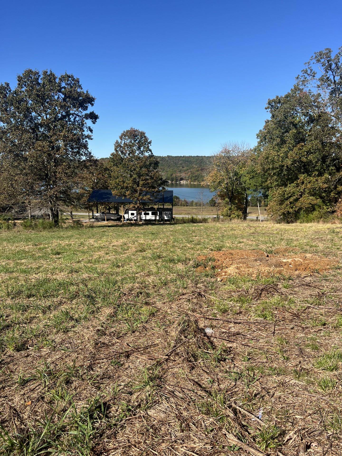 Owner Reduced for quick sale?  Are you looking for a view of Cedar Creek Lake with quick access to the lake. This land has no restrictions so build your dream home or use as an investment property.  Utilities and Electrical connects are located on Lost Creek rd. for hook up.  This land is within 1/4 mile to public boat dock.  Owner willing to help financially with easement road as well as perc testing.  Don't wait too long to schedule your showing. Possible owner financing is an option with down payment.