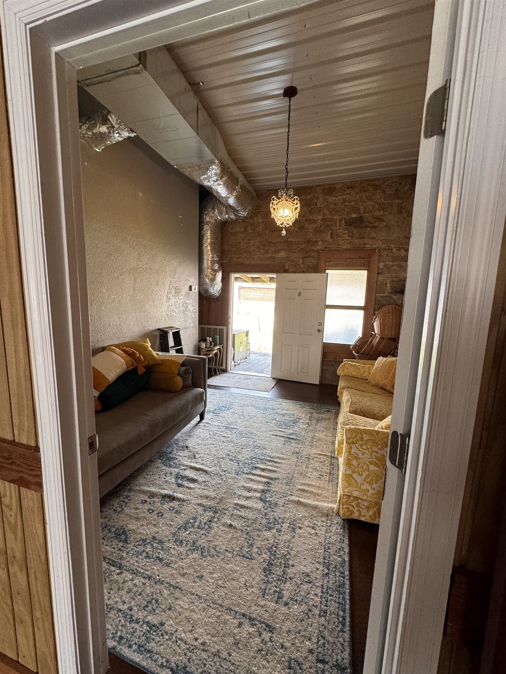 Put your business on the map.  Own your own space right on the highwy in Phil Campbell, Al.  This place has been use to take photography.  The back drop of the rock and historic brick can make a good option for just about any business you can dream up.  Call today and lets get you in this space on 13 in Phil Campbell.