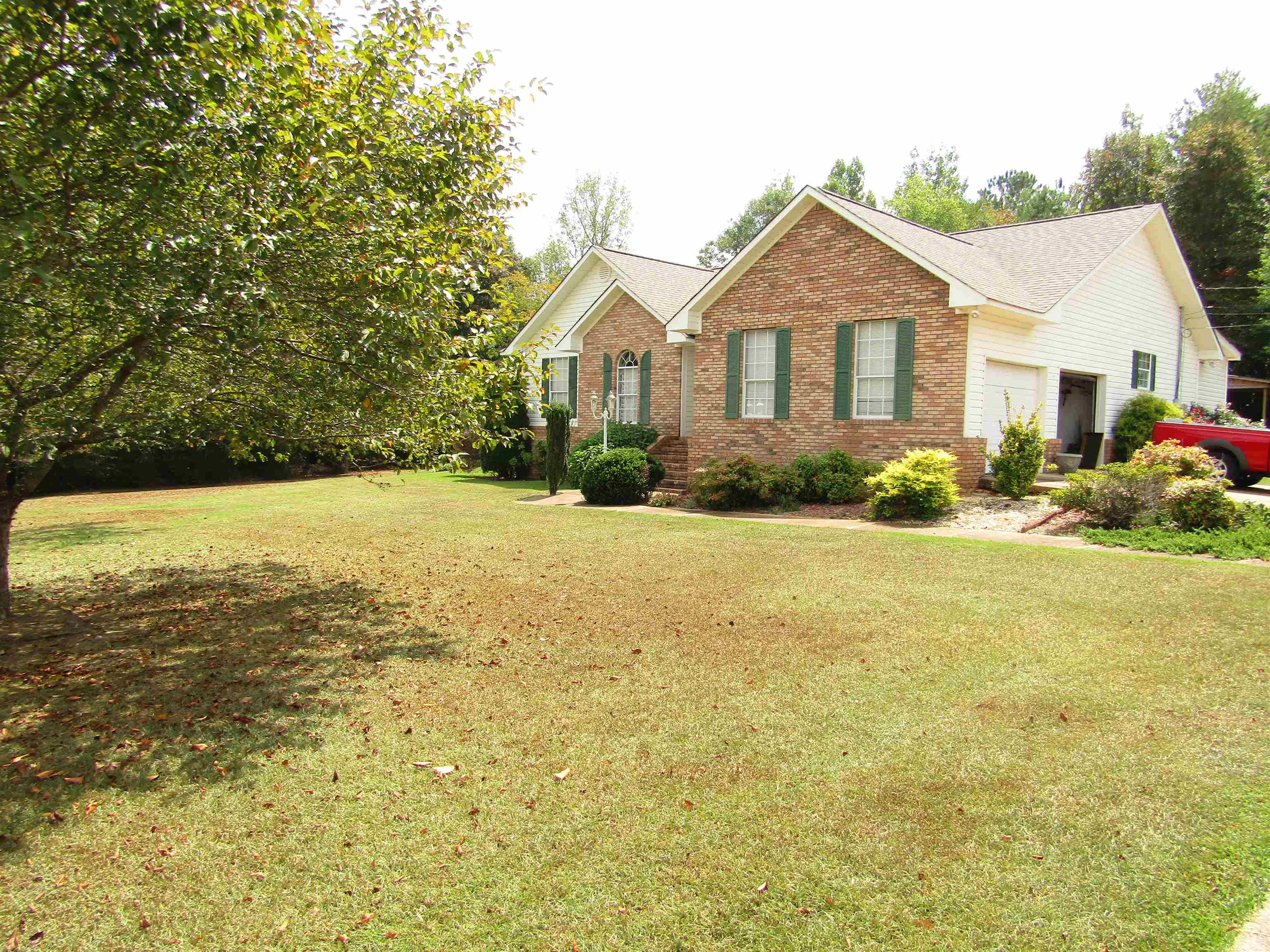 A very nice 3 bedroom 2 bath house located on a large lot.  The house has a sunroom with furniture, safe room, new roof, 8 x 16 storage building, patio with storage.