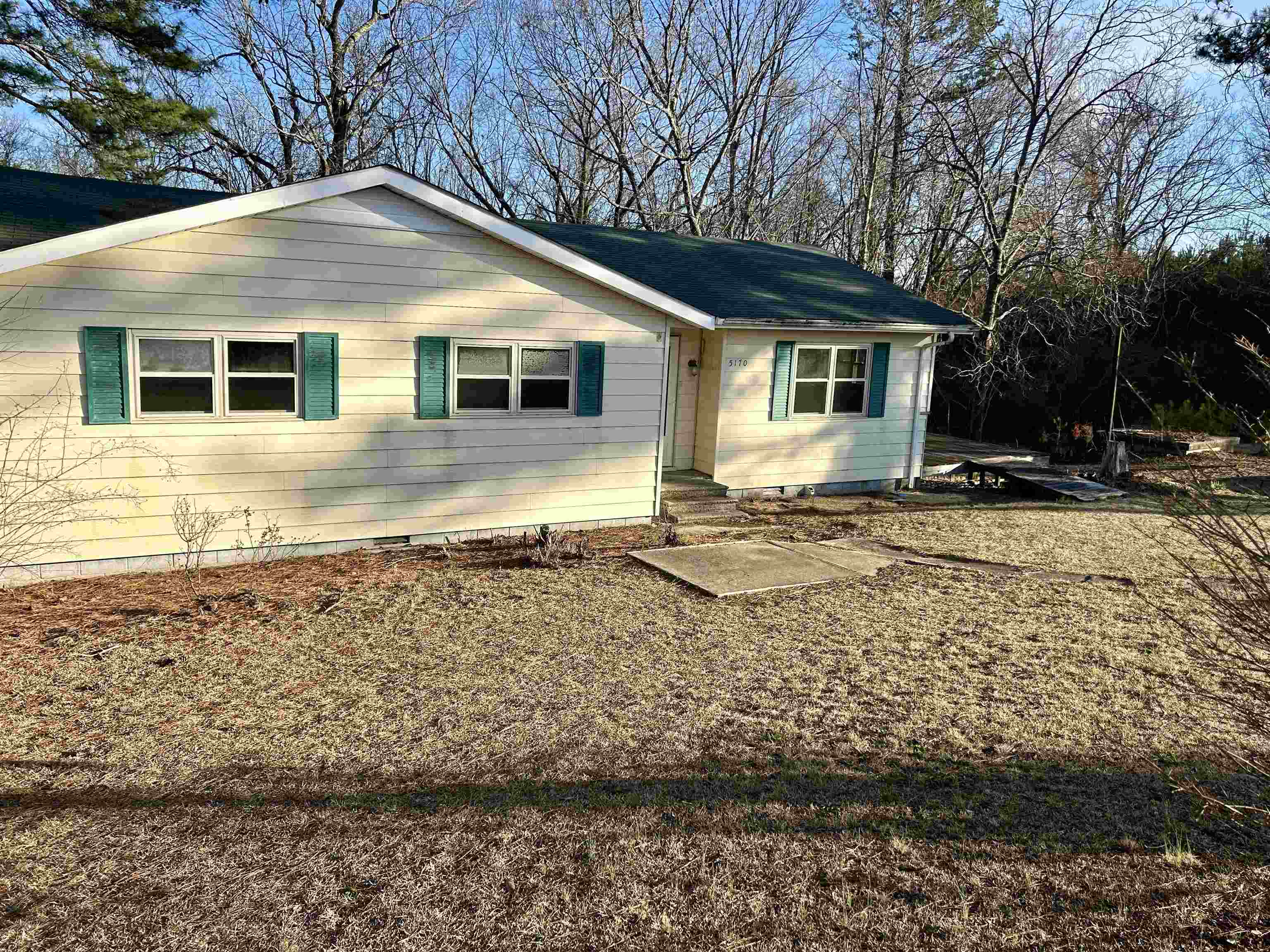 Sitting on 2.2+/- acres, this 4 bedroom, 1 bath home is perfect for investors!  It features a large deck and a private balcony off the bedroom.  There is also a storm seller.  Call to schedule your showing today!