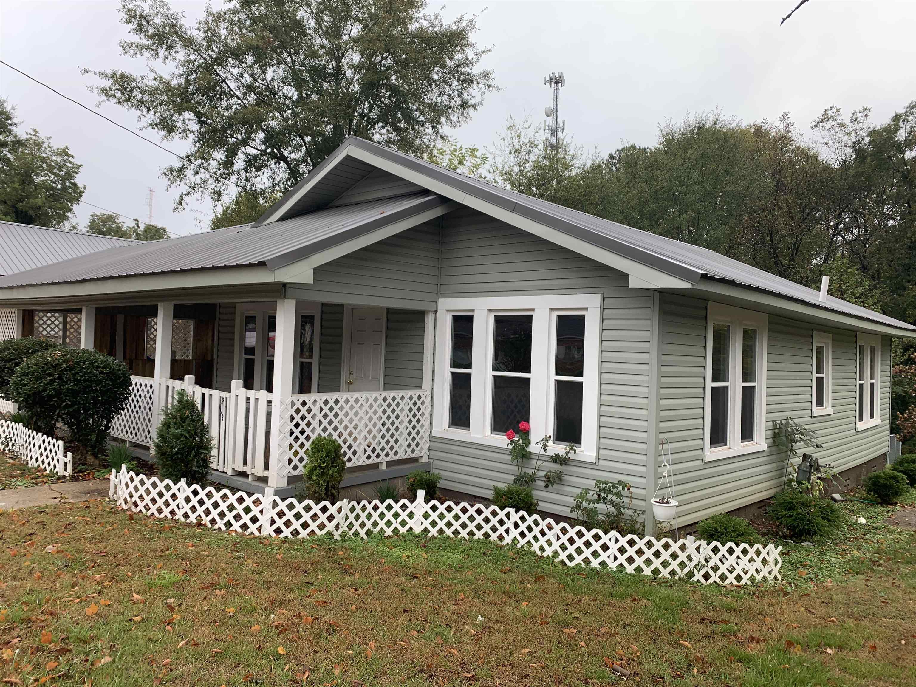 Come and look at this 3 bedroom and 1.5 Bath home in Red Bay city limits and fall in Love.  There have been tons of work done to this little house and is move in ready for you and your family.  Don't wait.  It won't last long.